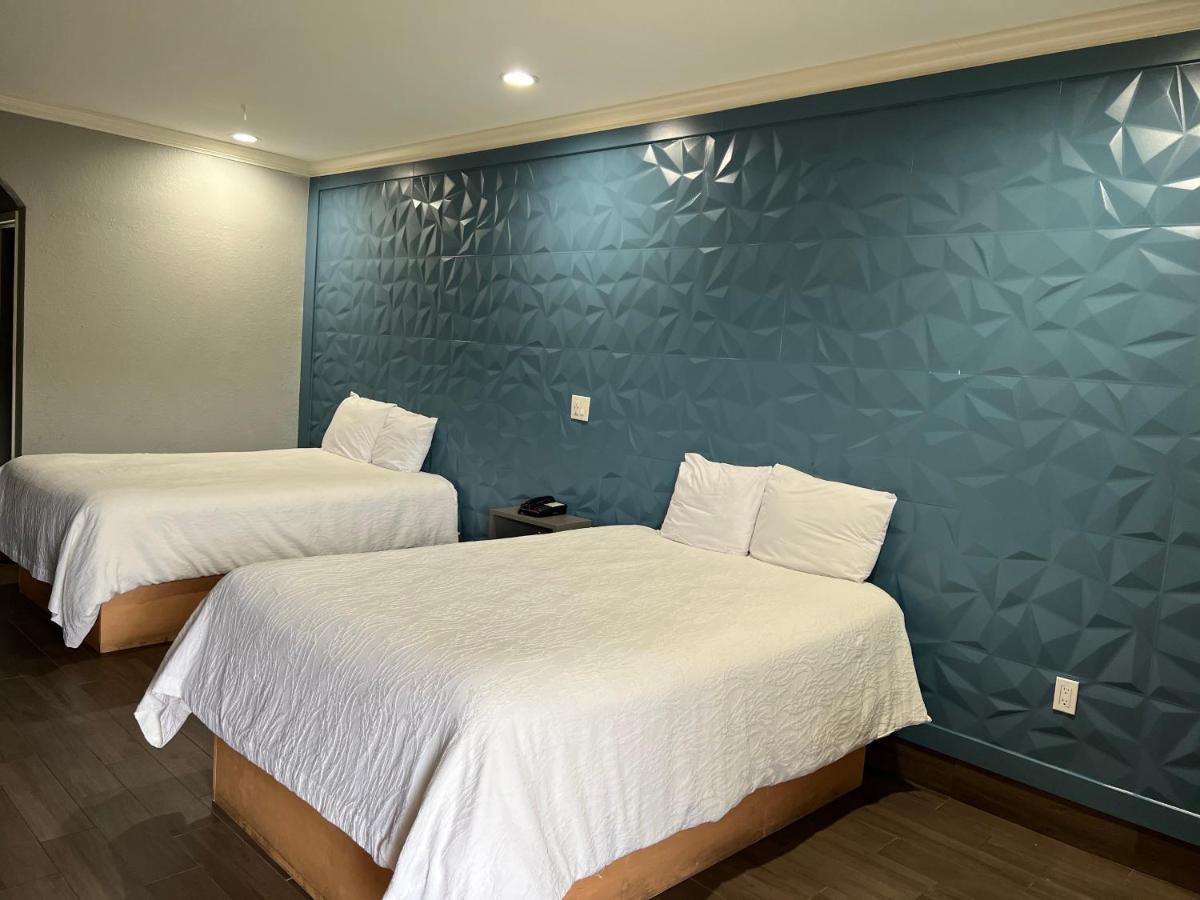 The Symphony Inn & Suites Houston Exterior foto